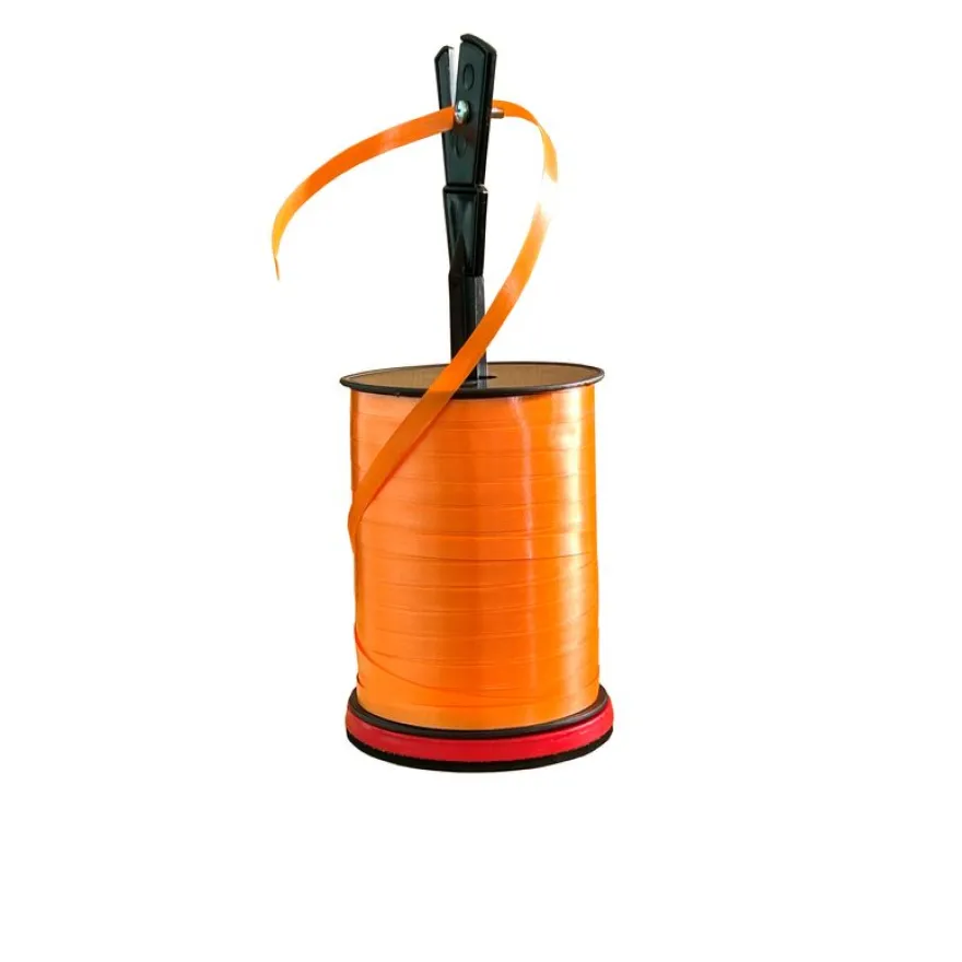 Dérouleur pour bobine de bolduc avec couteau