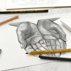 Faber-Castell Creative Studio - Set fusain - 3 crayons de couleur : noir, blanc, sanguin