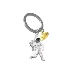 Metalmorphose - Porte-clés - astronaute et planète saturne